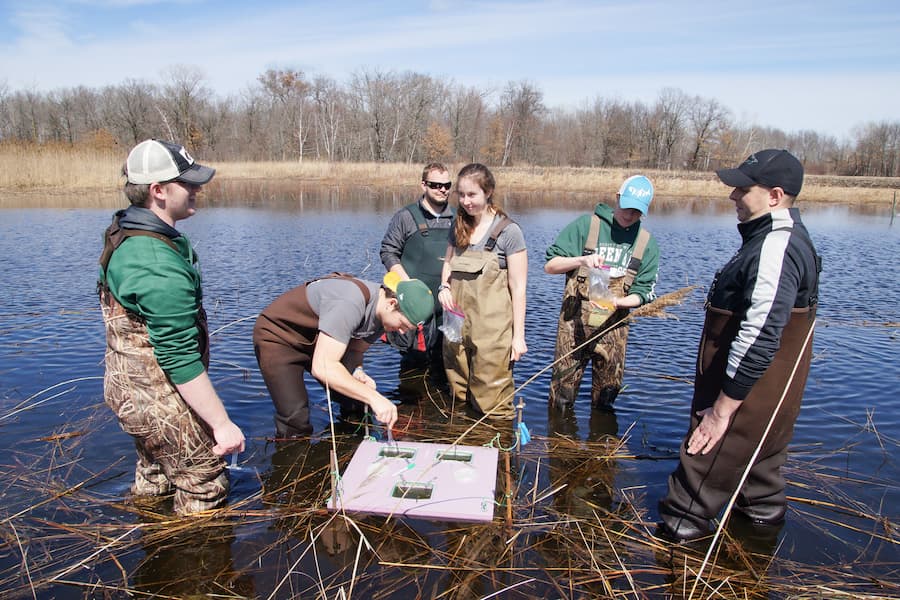 Group of students do water research