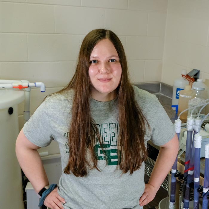 Emma Loucks poses in UWGB's water testing lab