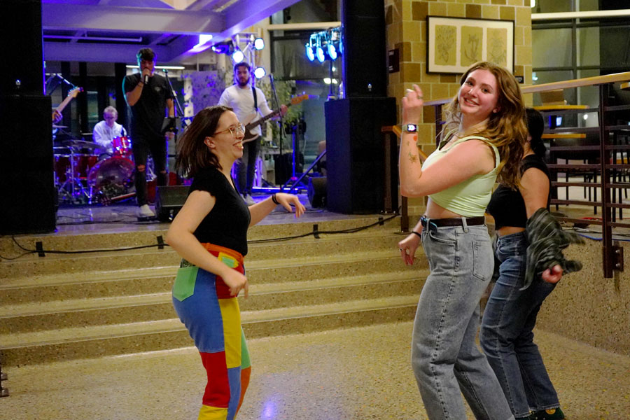 Students dancing to band playing at the university union