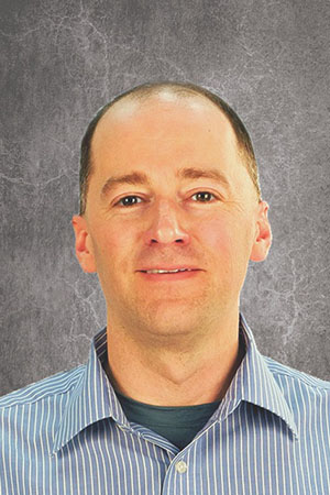 headshot of David Voelker