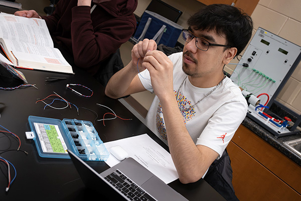 Male student working in engineering lab