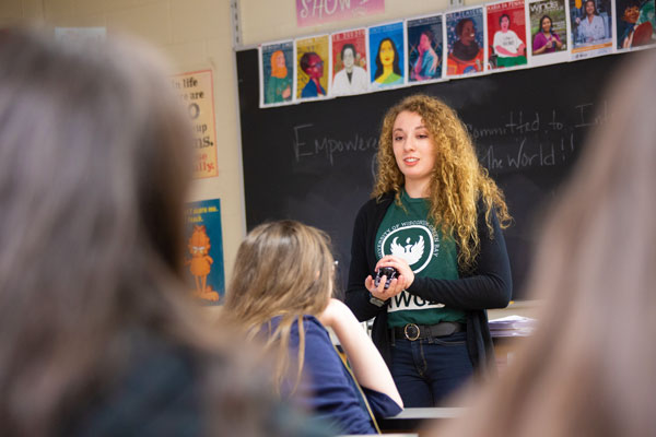 Student speaking to high school class