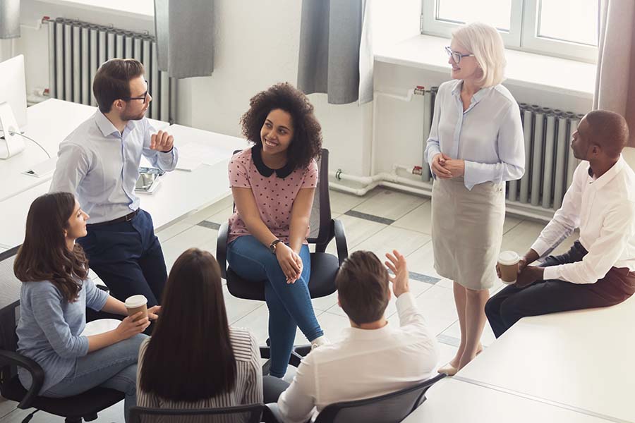 business group discussing work in a meeting