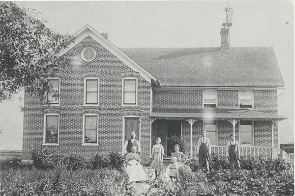 Black and white photo of a Belgian American farmhouse