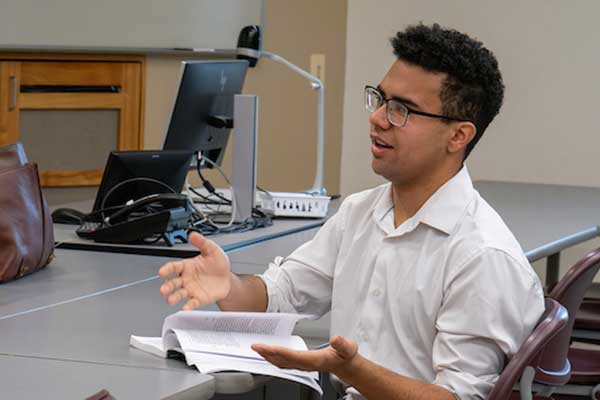 Student engaged in discussion.