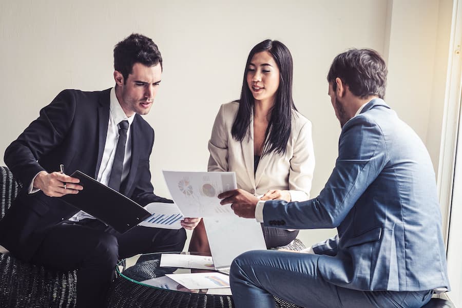 Group of colleagues work together in the office