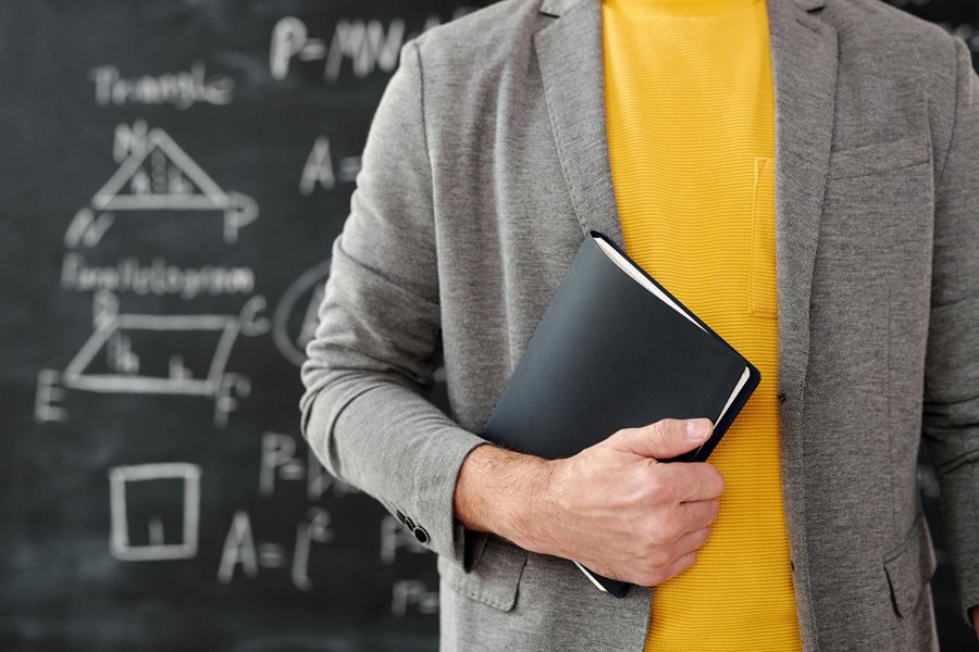 Teacher holding book