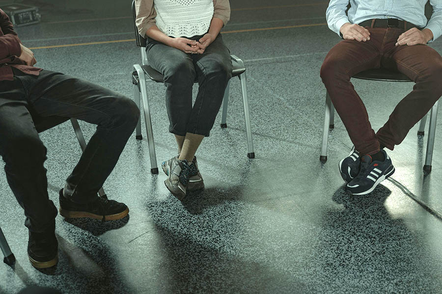Closeup of people in group counseling