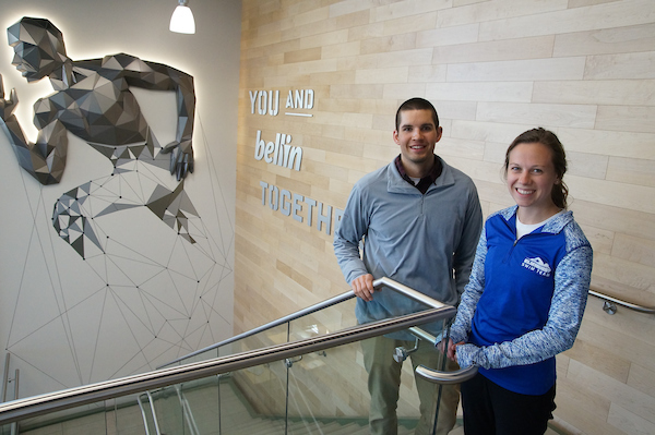 Bellin interns pose by logo