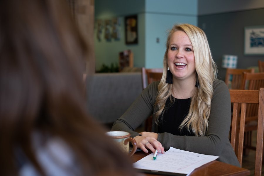 Advisor talking with student