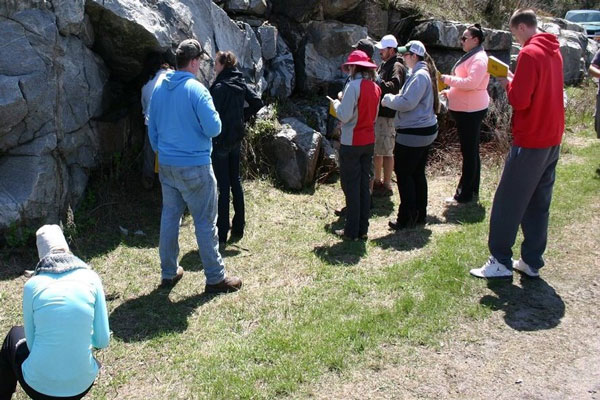 Students perform environmetal research outdoors