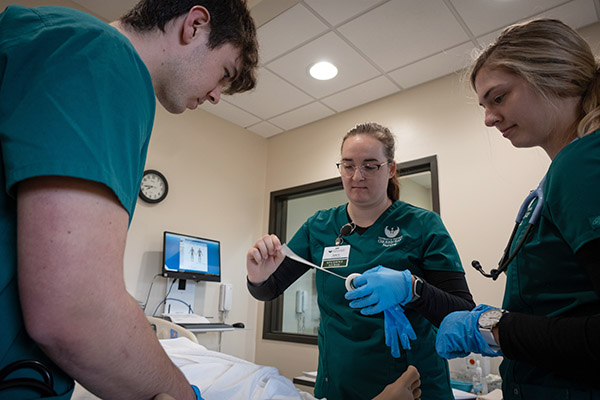 UWGB Nursing students work with a patient