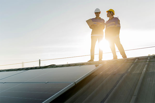 sustainability specialist getting solar pannels installed